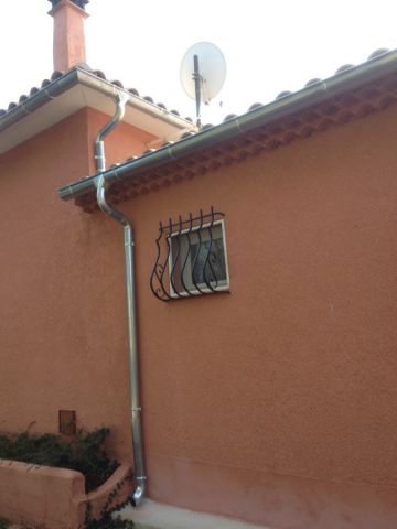 Pose de gouttières en zinc Aix